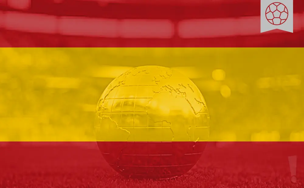 A globe with a football icon on a Spanish flag background.