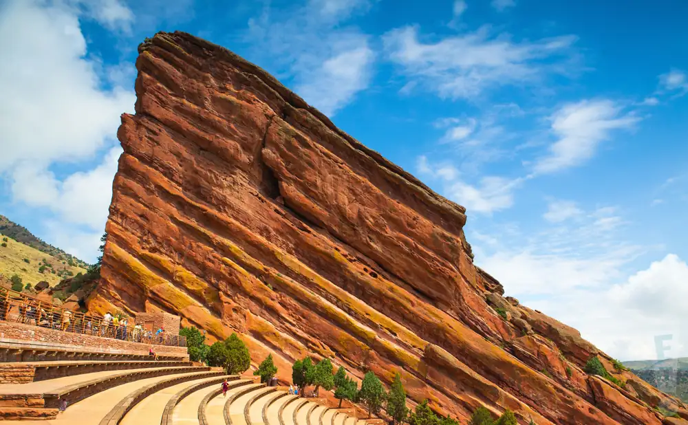 Red Rocks Amphitheatre with a large sandstone monolith and tiered seating.