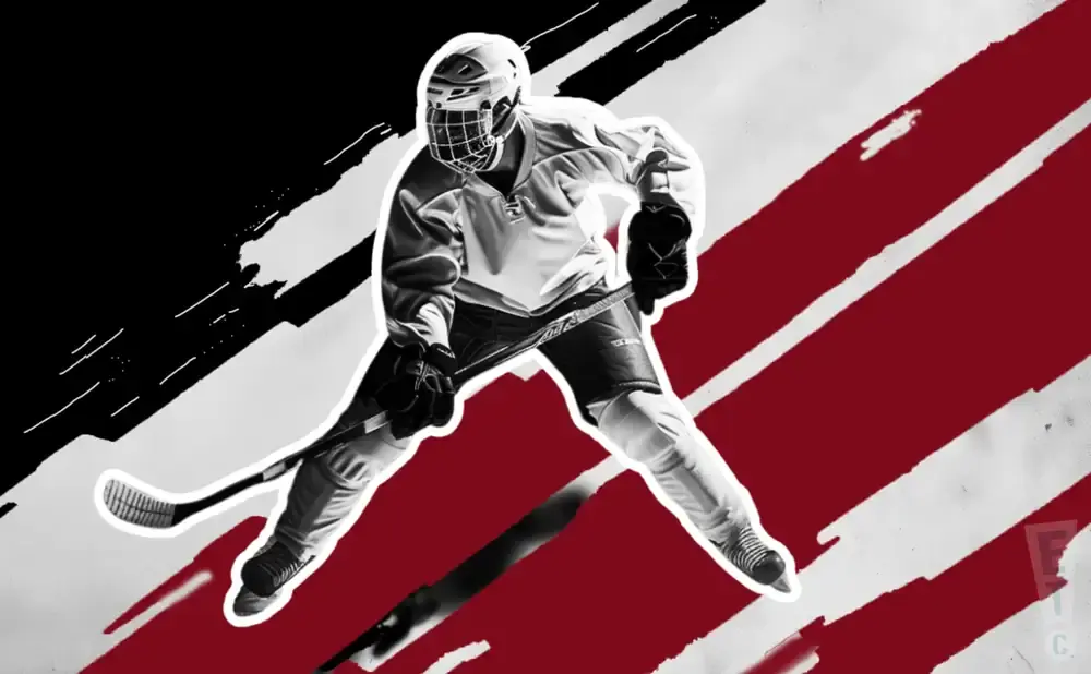 Black and white image of a hockey player in uniform against a red and white striped background.