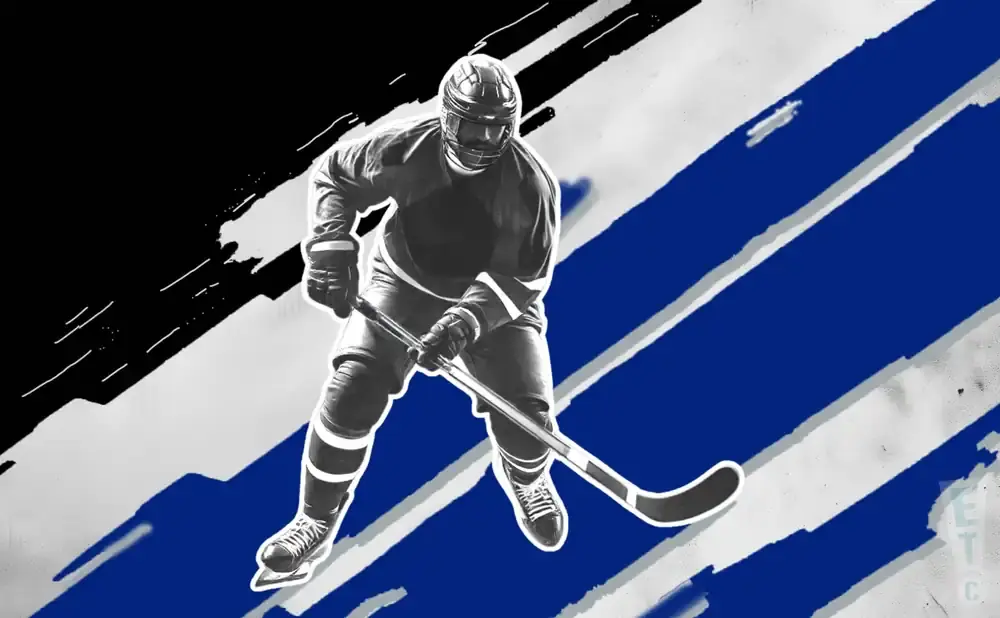 Black and white hockey player in action on a blue and white striped background.