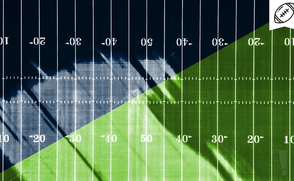 An American football field with yard lines and numbers.