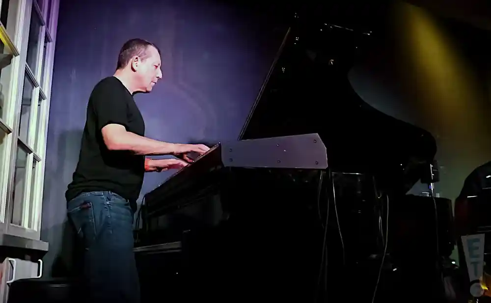 a picture of pianist jeff lorber performing on stage at south jazz club