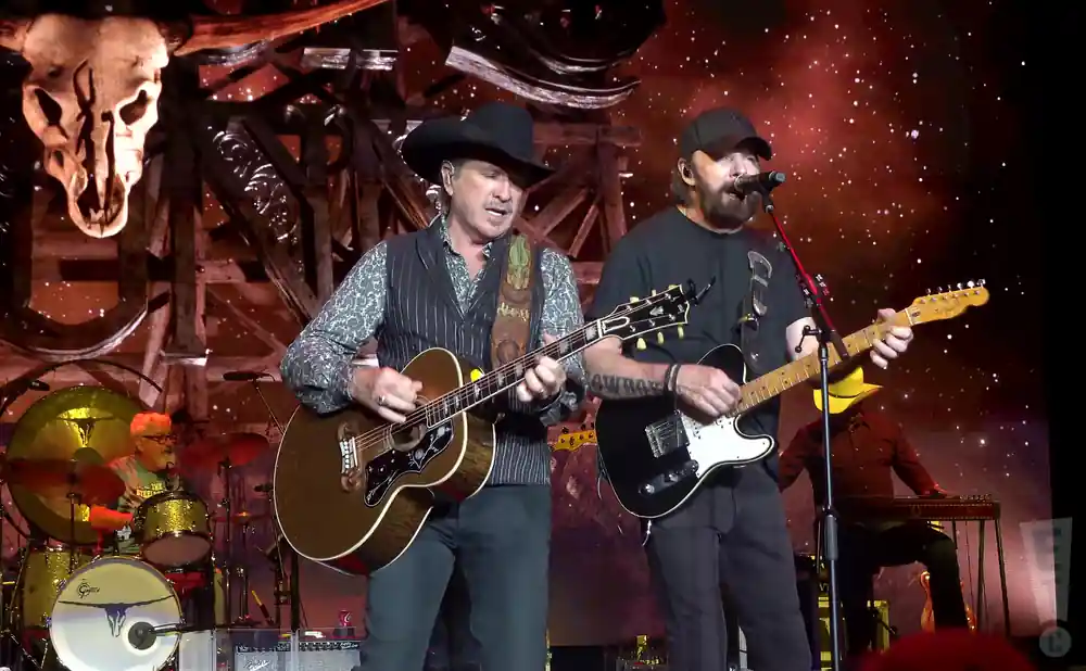 brooks and dunn performing side by side on stage