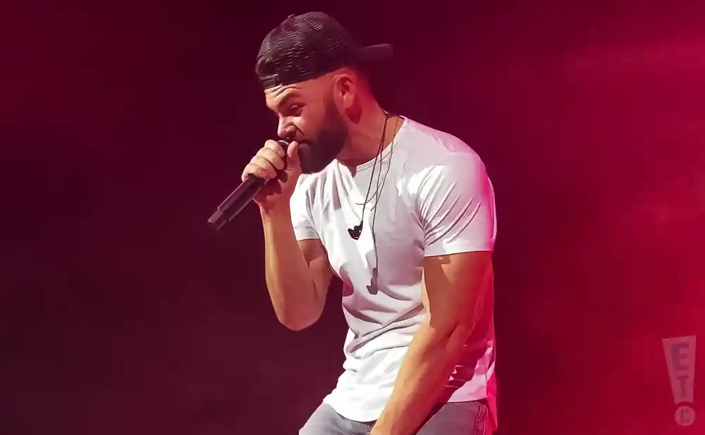 dylan scott performing on stage at the mississippi coliseum in jackson mississippi