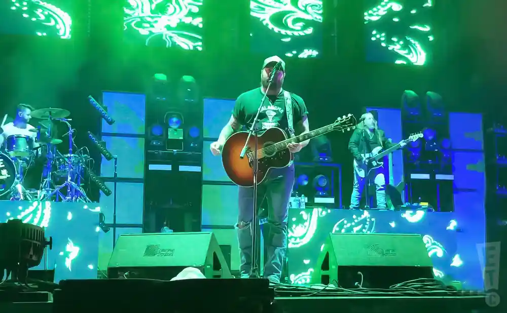 koe wetzel performing on stage with a guitar in tulsa oklahoma
