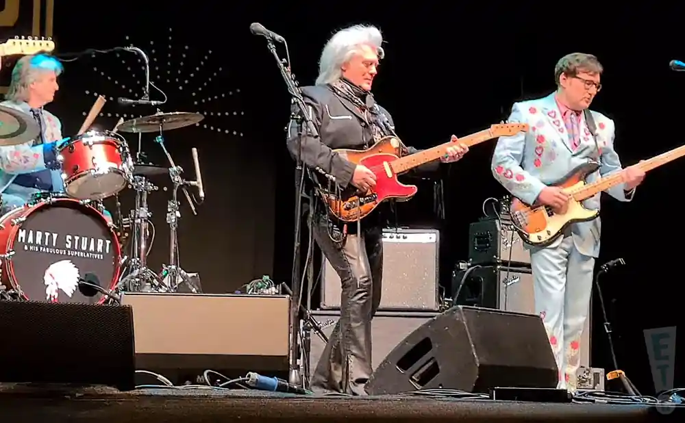marty stuart playing the electric guitar at stanford hall in lutterworth england