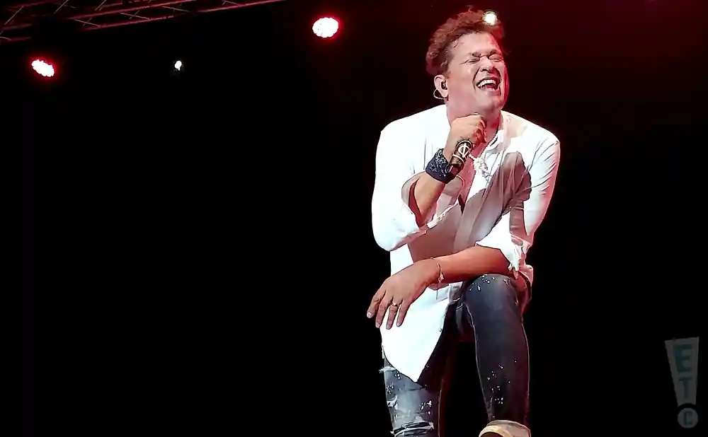 carlos vives performing on stage at the lakelive festival in swiss