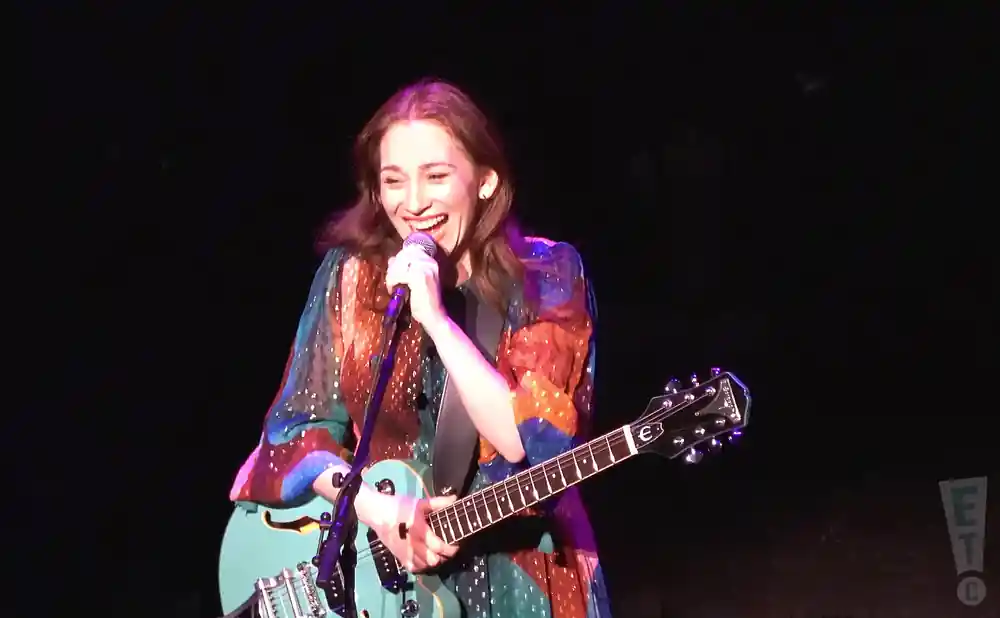 regina spektor smiling while performing live