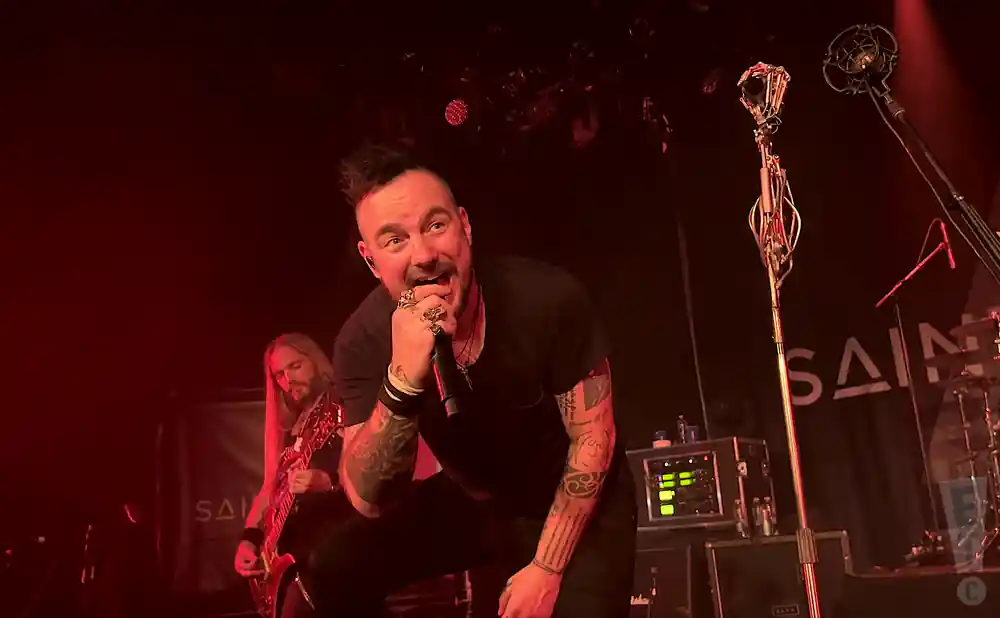 three days grace singer and electric guitarist performing live