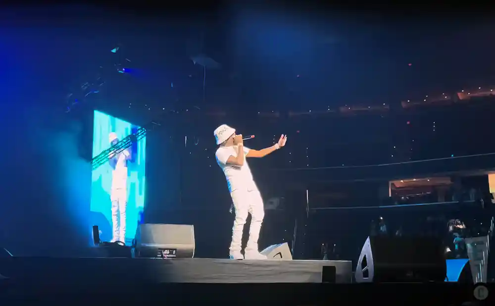 a picture of moneybagg yo performing on stage