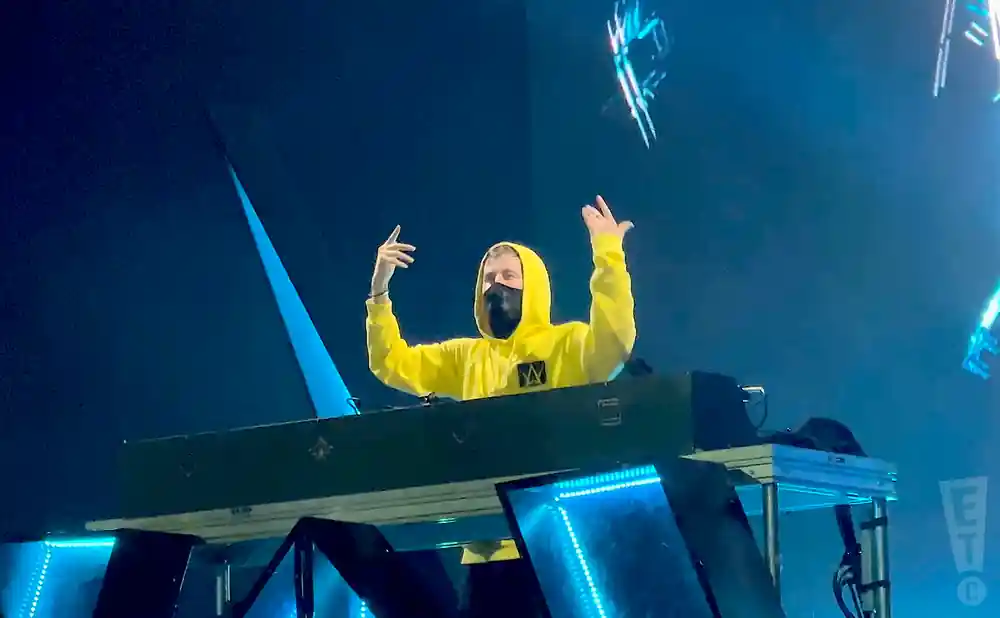 alan walker djing live in yellow sweatshirt