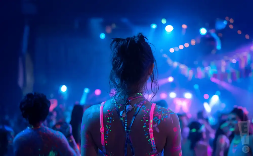 a person viewed from behind enjoying the hyperglow providence party