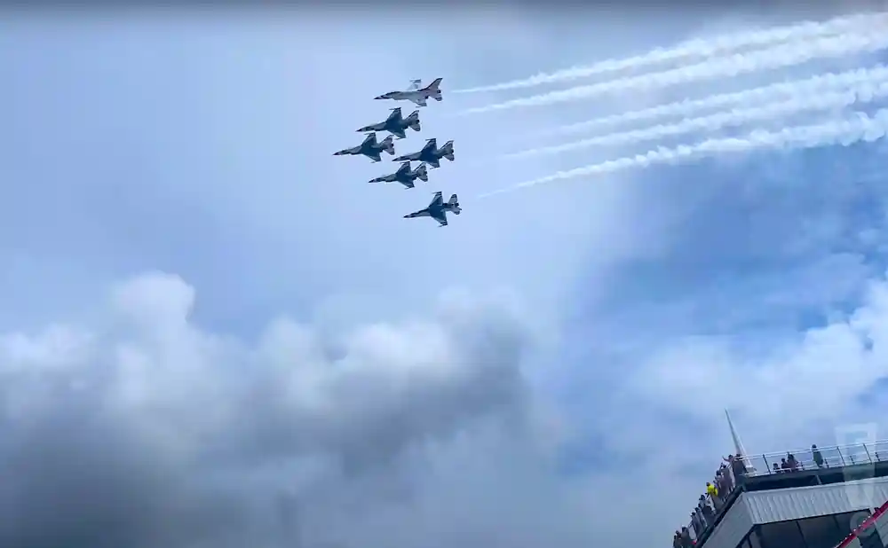 usaf thunderbirds flying over the pocono raceway.