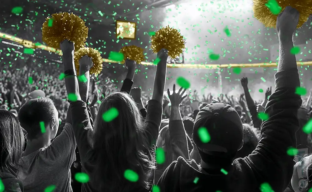 a crowd of marywood pacers fans cheering for their football team