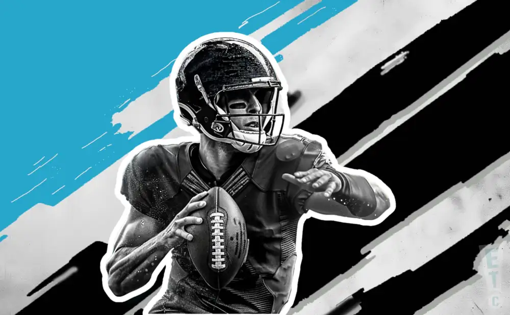 a carolina panthers football player runs with the ball