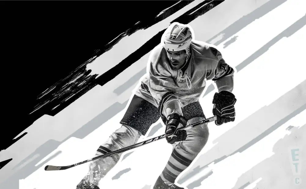 a blainville-boisbriand armada ice hockey player about to hit the puck