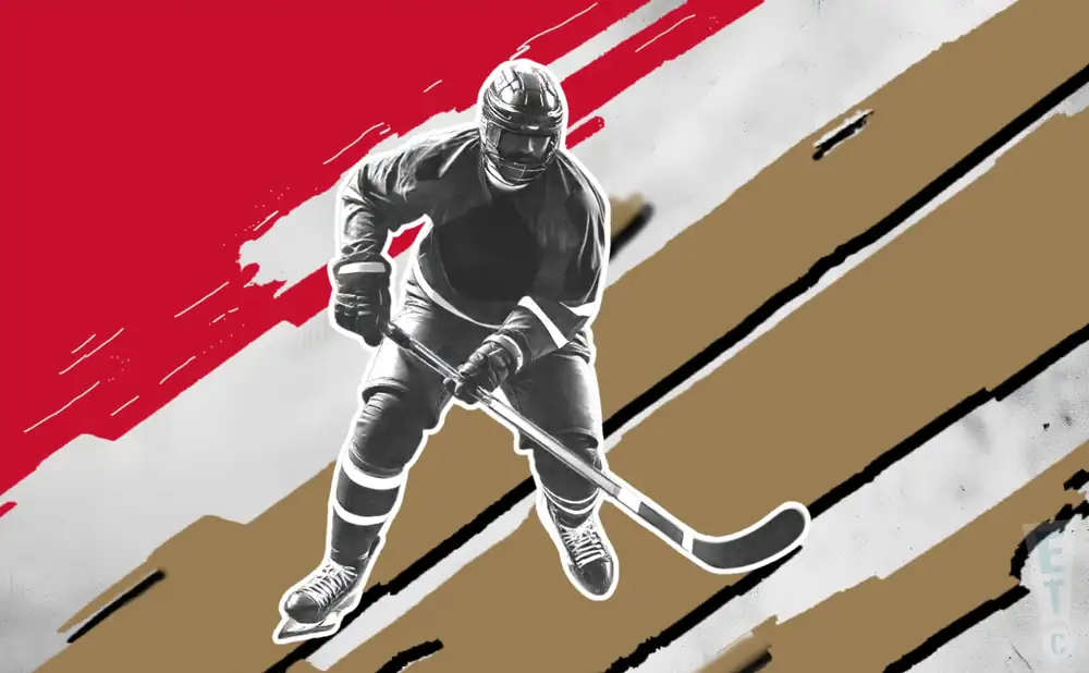 a hudson valley venom ice hockey player running down the rink