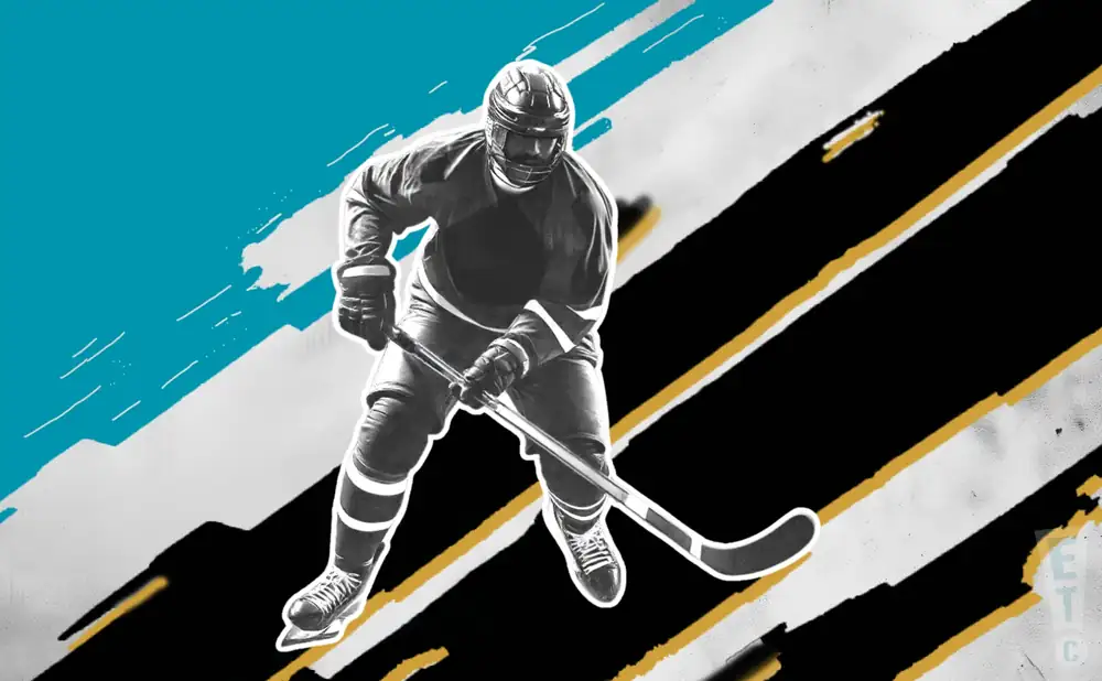 a tahoe knight monsters ice hockey player about to hit the puck