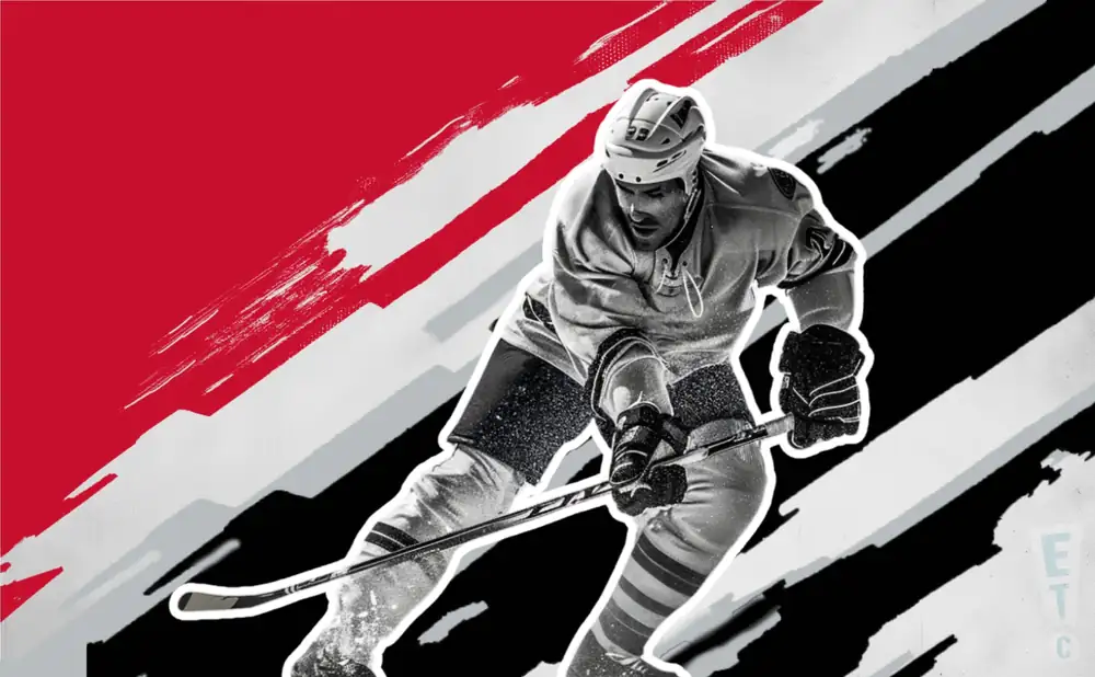 a vancouver giants ice hockey player about to hit the puck