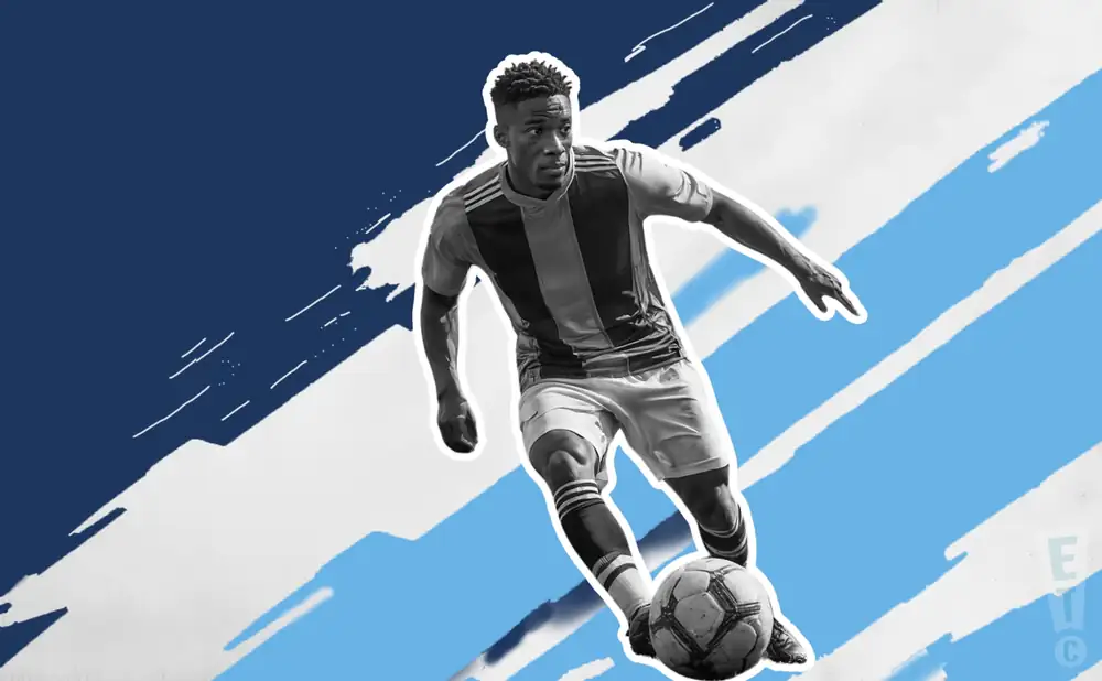 a chicago fire fc ii soccer player kicking the ball down field