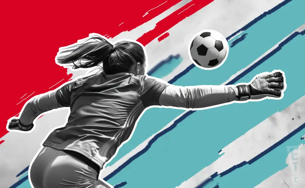 a kansas city current goalie soccer player diving to catch the ball