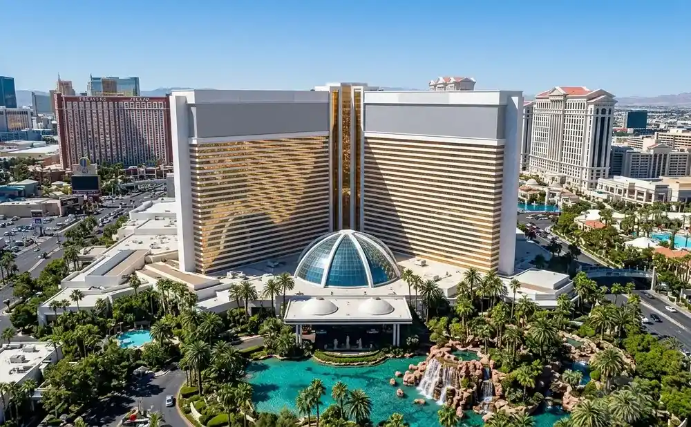 Las Vegas Mirage Resort with a domed entrance and lagoon with waterfalls.