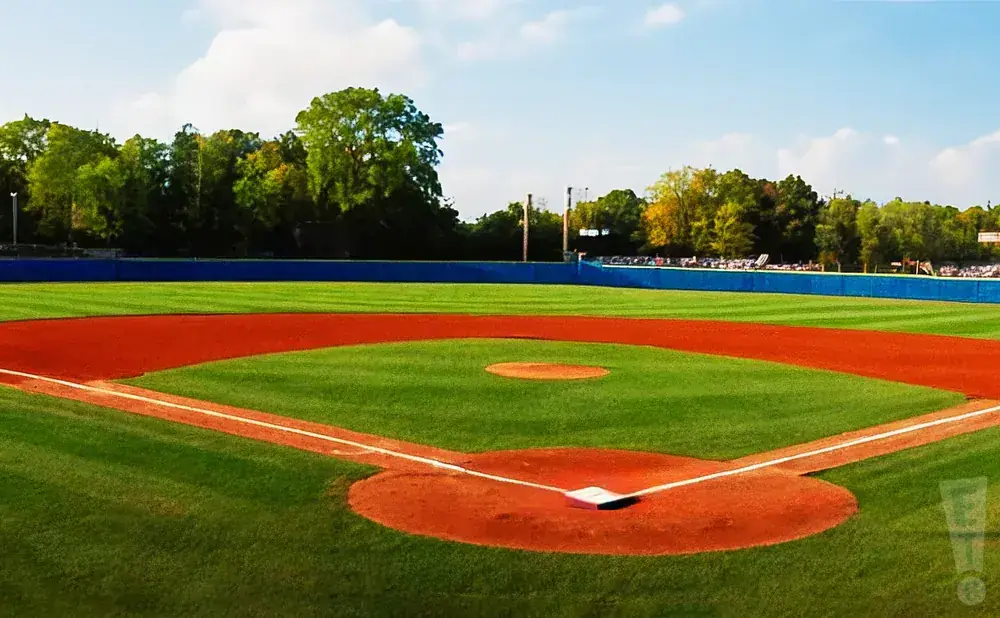 A baseball field on a sunny day.
