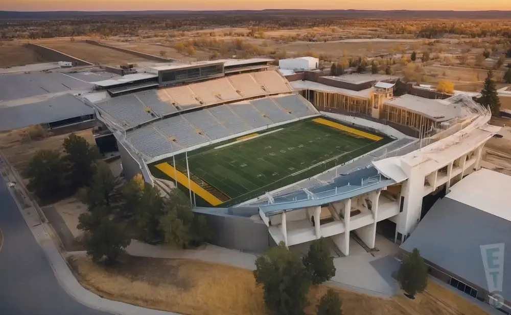 Aerial view of a football stadium at sunset.