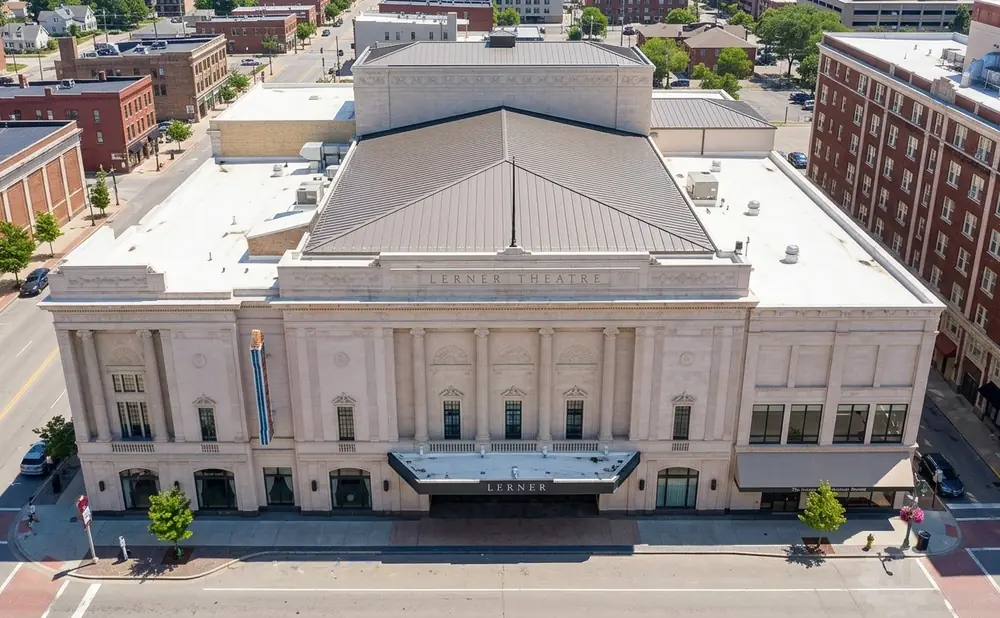 Aerial view of the Lerner Theatre, a grand building with classical architecture and a prominent marquee.