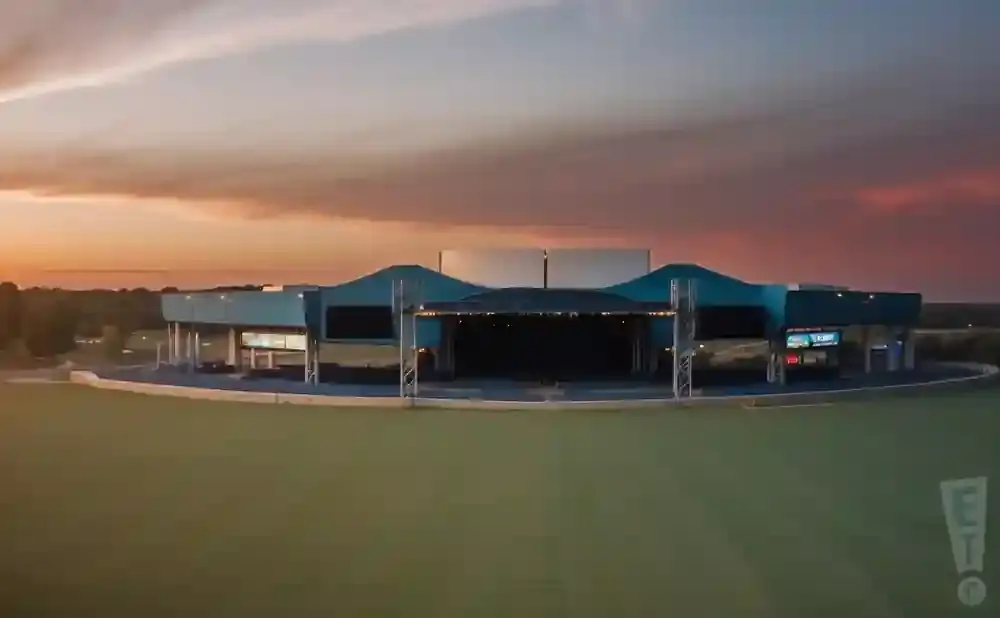 An outdoor concert venue at sunset.