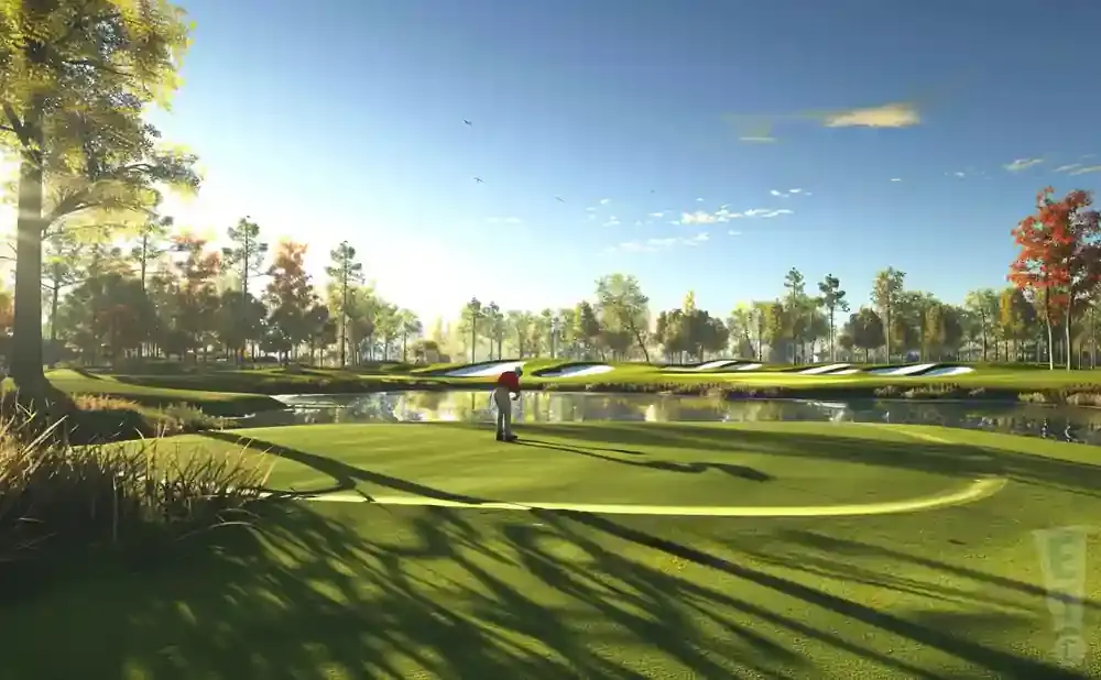 A golfer on a putting green with a pond and sand traps in the background under a sunny blue sky.