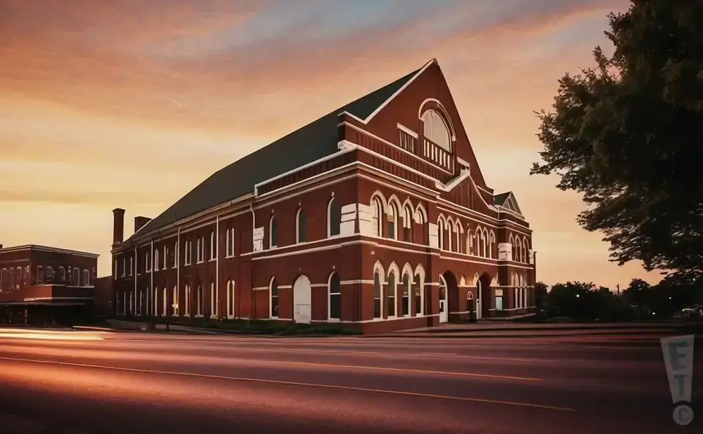 Ryman Auditorium at sunset with light trails on the road.