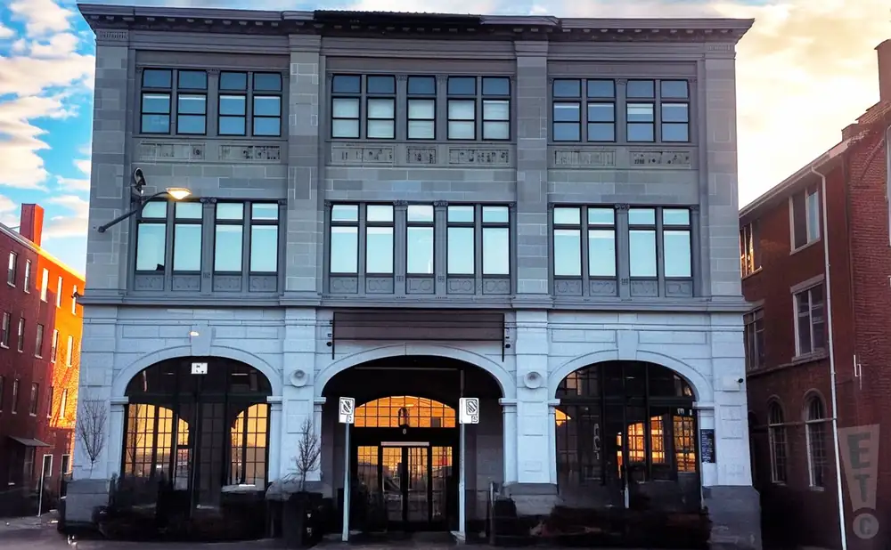 an exterior promotional venue picture of barre opera house with a sunset sky