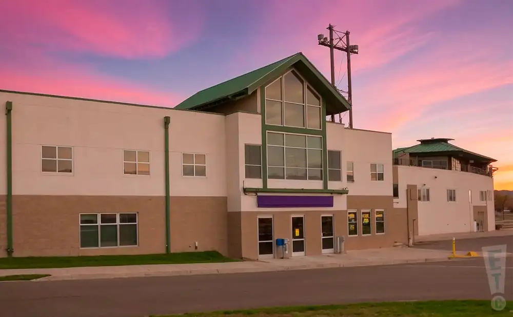 an exterior promotional photograph of centene stadium in great falls, montana, captured at sunset.
