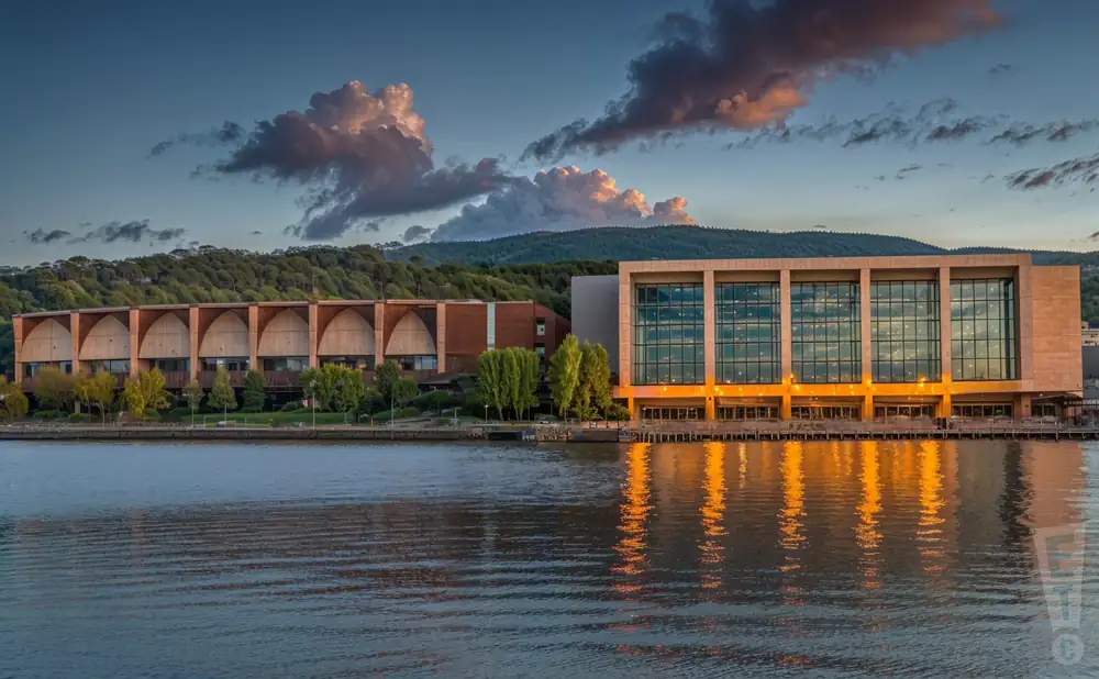an ultra-realistic photograph of decc arena in duluth, minnesota, captured at sunset. 