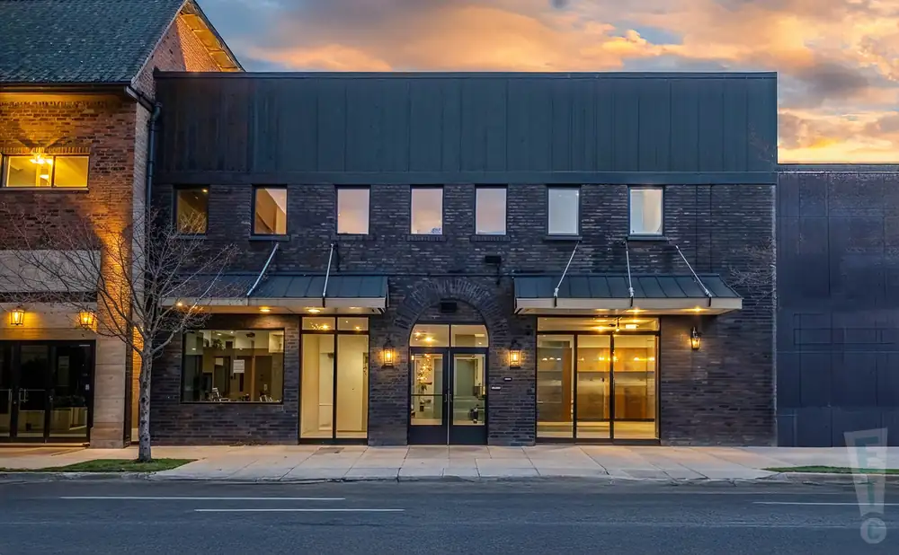 a photograph of district 142 in wyandotte, michigan, captured at sunset. 