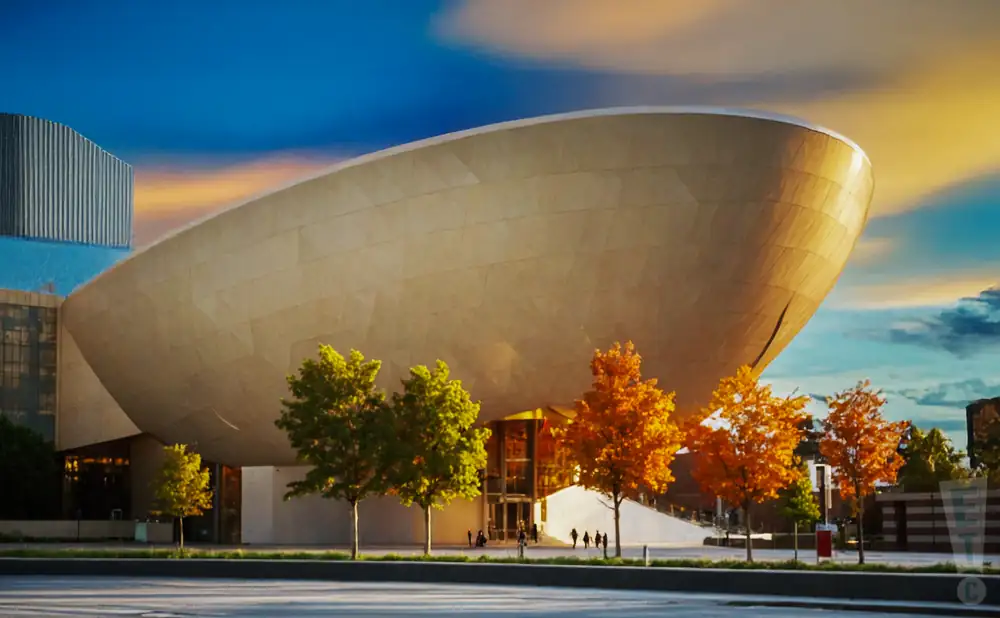 an exterior promotional venue picture of hart theatre at the egg with a sunset sky