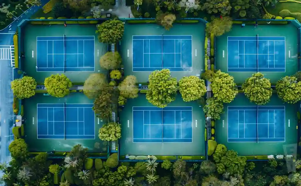 an aerial picture of the oasis tennis & pickleball club during the day 