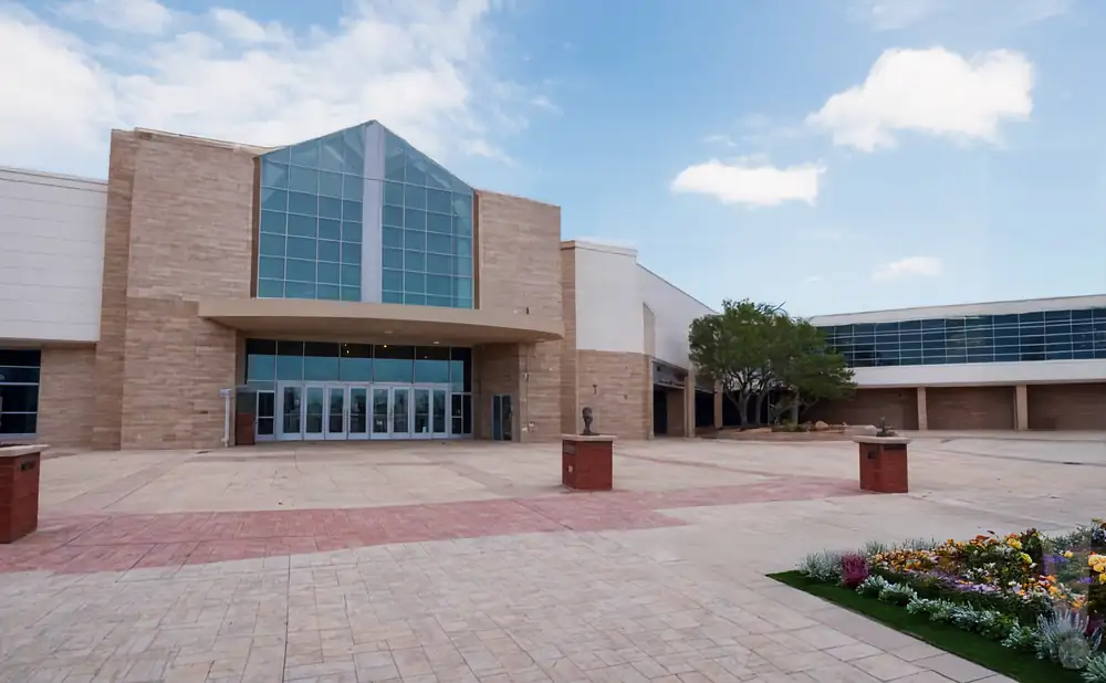 an exterior promotional venue picture of performing arts center at ocean city convention center with a sunny sky