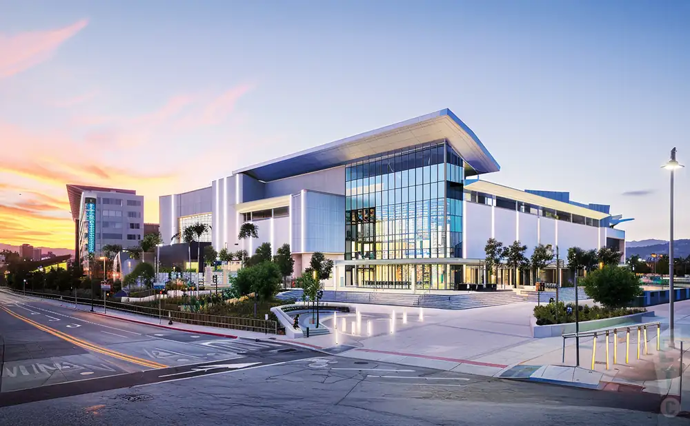 an exterior promotional venue picture of safe credit union performing arts center with a sunset sky