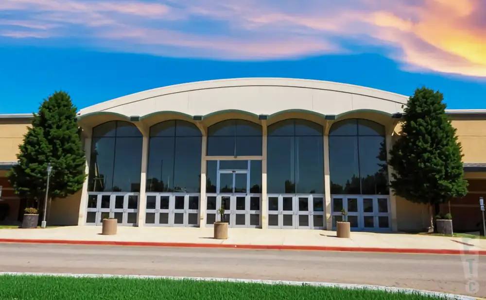 an exterior promotional venue picture of salem civic center with a sunset sky