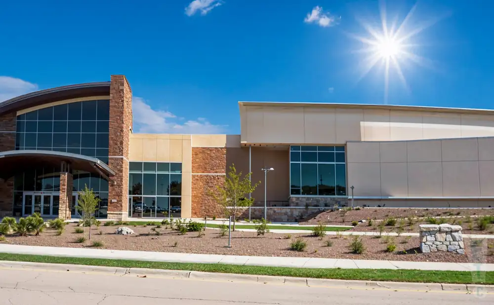 exterior promotional venue picture of scheels arena with a sunset sky