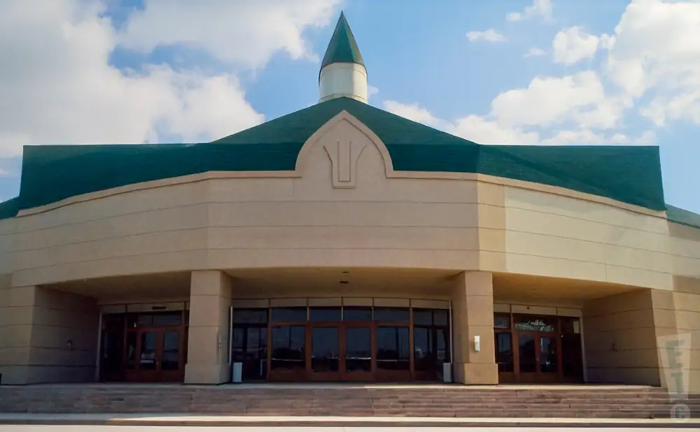 an exterior promotional venue picture of show place arena with a cloudy sky