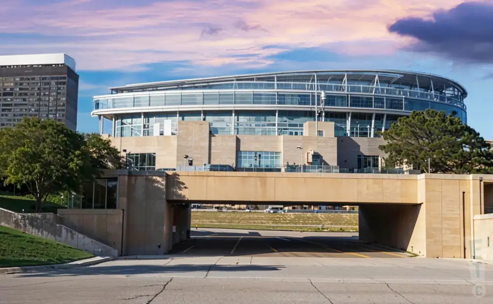 an exterior promotional venue picture of soldier field with a sunset sky
