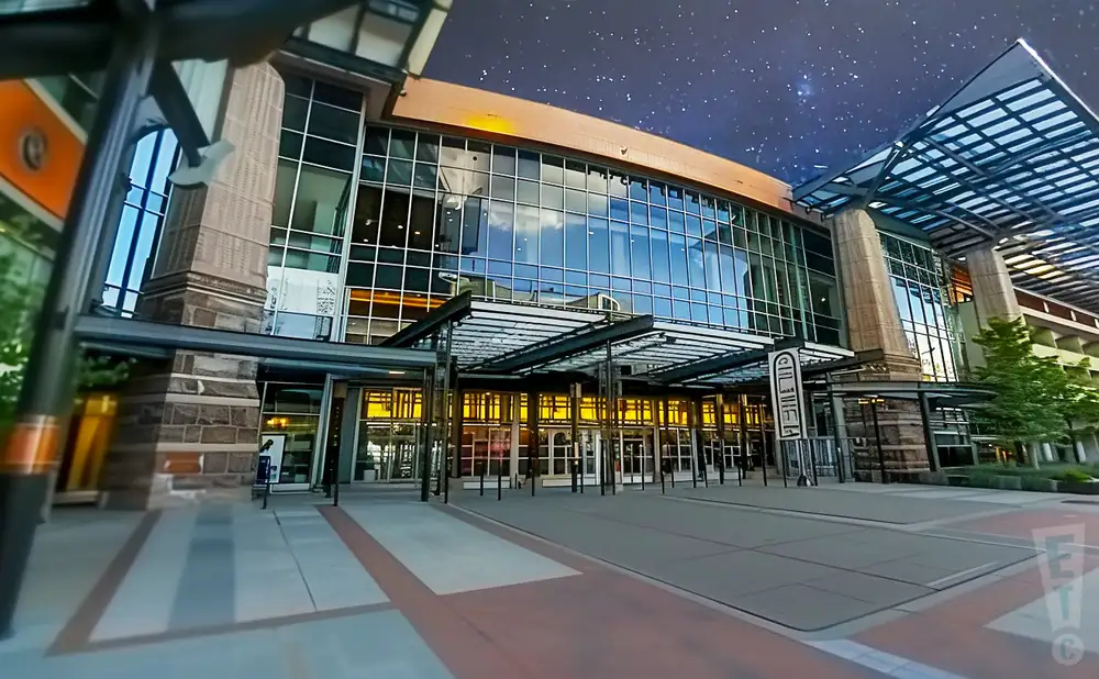 a promotional exterior picture of the buell theatre at night