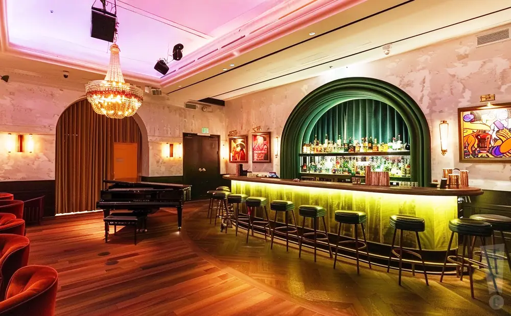 an interior picture of the the club at stage ae during the night while empty