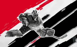Hockey goalie in a crouched position, with a red and black abstract background.