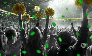 People cheering with gold pom-poms and green confetti.