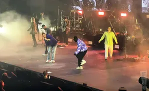 elevation worship performing on stage with sfog in the background