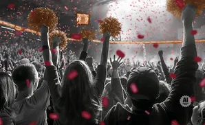 Crowd cheering with pom-poms and red confetti, black and white with color accents.